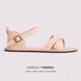 Crema | Flat leather sandals with ankle straps and debossed PLG three tree logo in soles, shown on a light gray background with text below reading 'SANDALS / VENEZIA' and '100% VEG-TAN LEATHER'.