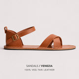 Miele | Flat leather sandals with ankle straps and debossed PLG three tree logo in soles, shown on a light gray background with text below reading 'SANDALS / VENEZIA' and '100% VEG-TAN LEATHER'.