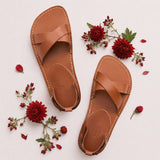 Miele | Flat leather sandals with ankle straps and debossed PLG three tree logo in soles