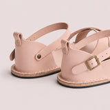 Crema | Flat leather sandals with ankle straps and debossed PLG three tree logo in soles