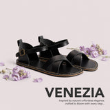 Nero | Flat leather sandals with ankle straps and debossed PLG three tree logo in soles