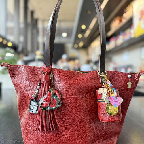 I love the Rollie Pouch! I want one in every color! So handy! It holds my key fob - customer review photo