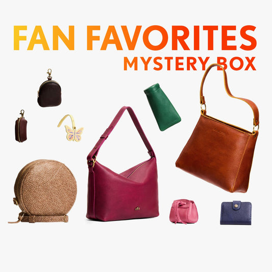A collection of bags and small goods with the title Fan Favorites Mystery Box