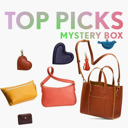 A collection of bags and small goods with the title Top Picks Mystery Box