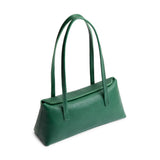 Bacalar | Leather bowler bag with magnetic closure against a white background