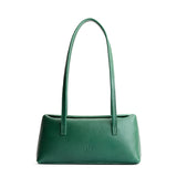 Bacalar | Leather bowler bag with magnetic closure against a white background