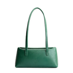 Bacalar | Leather bowler bag with magnetic closure against a white background