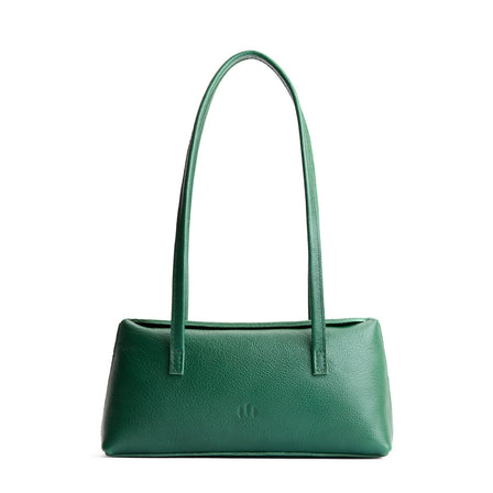 Bacalar | Leather bowler bag with magnetic closure against a white background