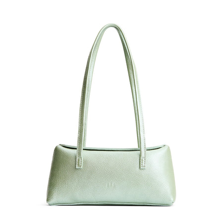 Beetle | Leather bowler bag with magnetic closure against a white background