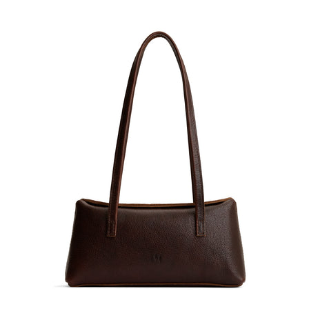 Coldbrew | Leather bowler bag with magnetic closure against a white background
