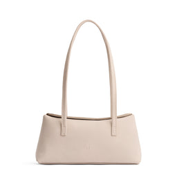 Dragon Bone | Leather bowler bag with magnetic closure against a white background