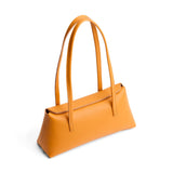 Sunflower | Leather bowler bag with magnetic closure against a white background