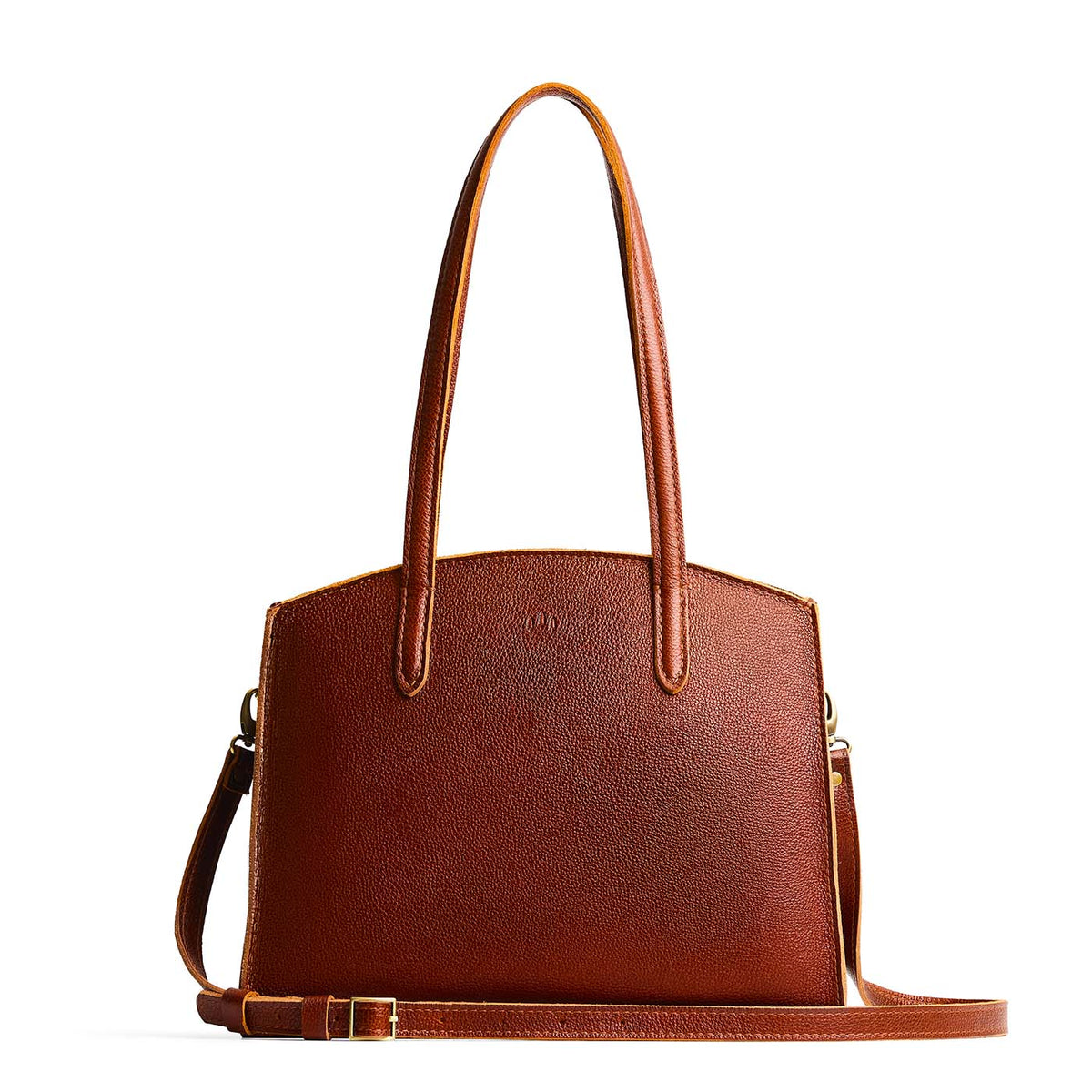 Nutmeg*Large | Leather tote bag with handles, adjustable crossbody strap, zipper top, and two back pockets