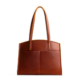 Nutmeg Large | Leather tote bag with handles, adjustable crossbody strap, zipper top, and two back pockets