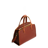 Nutmeg Medium | Leather tote bag with handles, adjustable crossbody strap, zipper top, and two back pockets