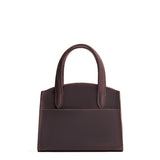 Full Moon Mini | Leather tote bag with handles, adjustable crossbody strap, zipper top, and a back pocket