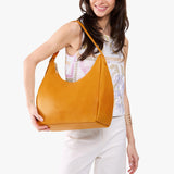 Sunshine Large | U-shaped, flat-bottomed leather shoulder bag with adjustable strap