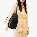 Pebbled--black Oversized | U-shaped, flat-bottomed leather shoulder bag with adjustable strap