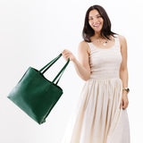 Bacalar Large | Model holding leather tote bag with interior snap key loop