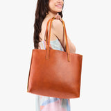Sienna Large | Model carrying leather tote bag with matching leather handles