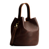 Coldbrew Large | Symmetrical bucket bag with handle, latch closure, and removable crossbody strap