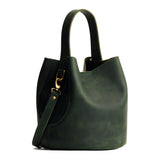 Evergreen Large | Symmetrical bucket bag with handle, latch closure, and removable crossbody strap