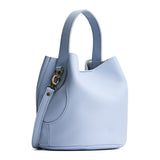 Skyway Large | Symmetrical bucket bag with handle, latch closure, and removable crossbody strap