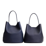 Night Owl | Size comparison image of two symmetrical leather bucket bags
