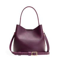 Plum*Small | Symmetrical bucket bag with handle, latch closure, and removable crossbody strap