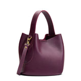 Plum Small | Symmetrical bucket bag with handle, latch closure, and removable crossbody strap