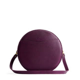 Plum | Large circle shaped leather bag with top zipper and carrying strap