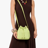 Shadow Lime Small | Model wearing slouchy crossbody bag with drawstring closure