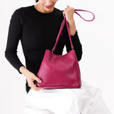 Cosmo | symmetrical bucket bag with latch closure and removable crossbody strap