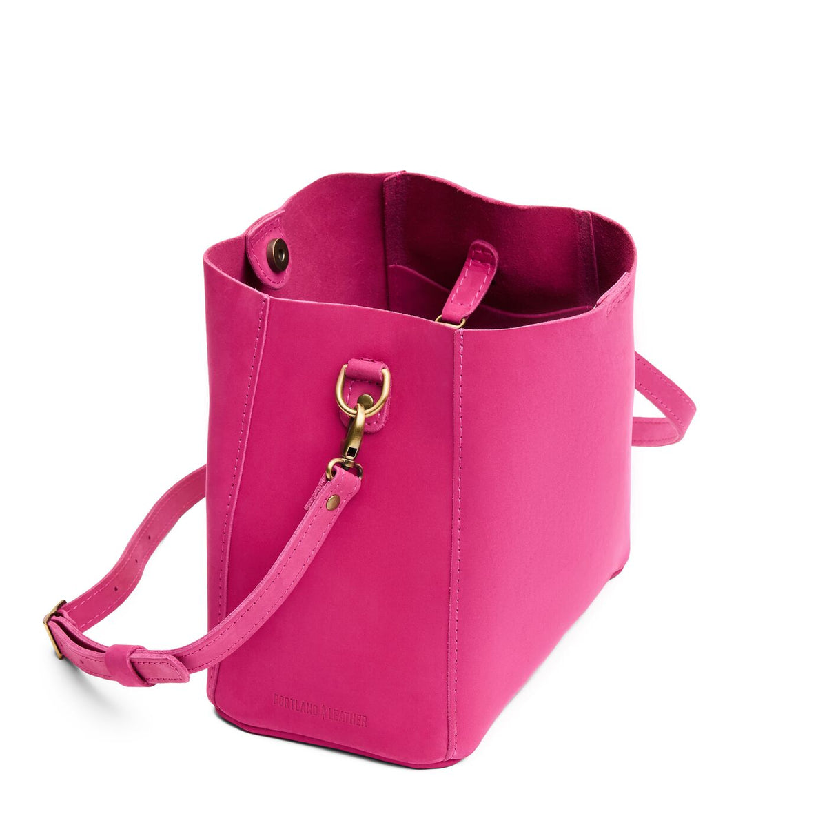 Royalty | Symmetrical bucket bag with latch closure and removable crossbody strap