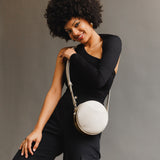 Bone Small | Circle shaped crossbody bag with top zipper