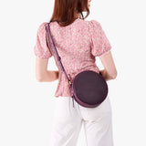 Larkspur Large | Circle shaped crossbody bag with top zipper