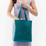 Aquarius | Model with medium Tote with dual shoulder straps and crossbody strap