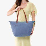 Denim Zipper | Large leather tote bag with sturdy bridle handles and front pocket