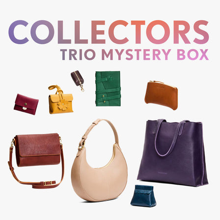 A collection of bags and small goods with the title Collectors Trio Mystery Box