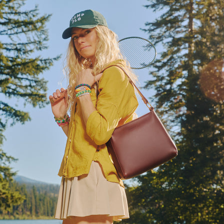 Cognac*Small | Triangular shoulder bag with antiqued brass finished hardware