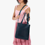 Boreal Classic | Model holding medium Tote with dual shoulder straps and crossbody strap
