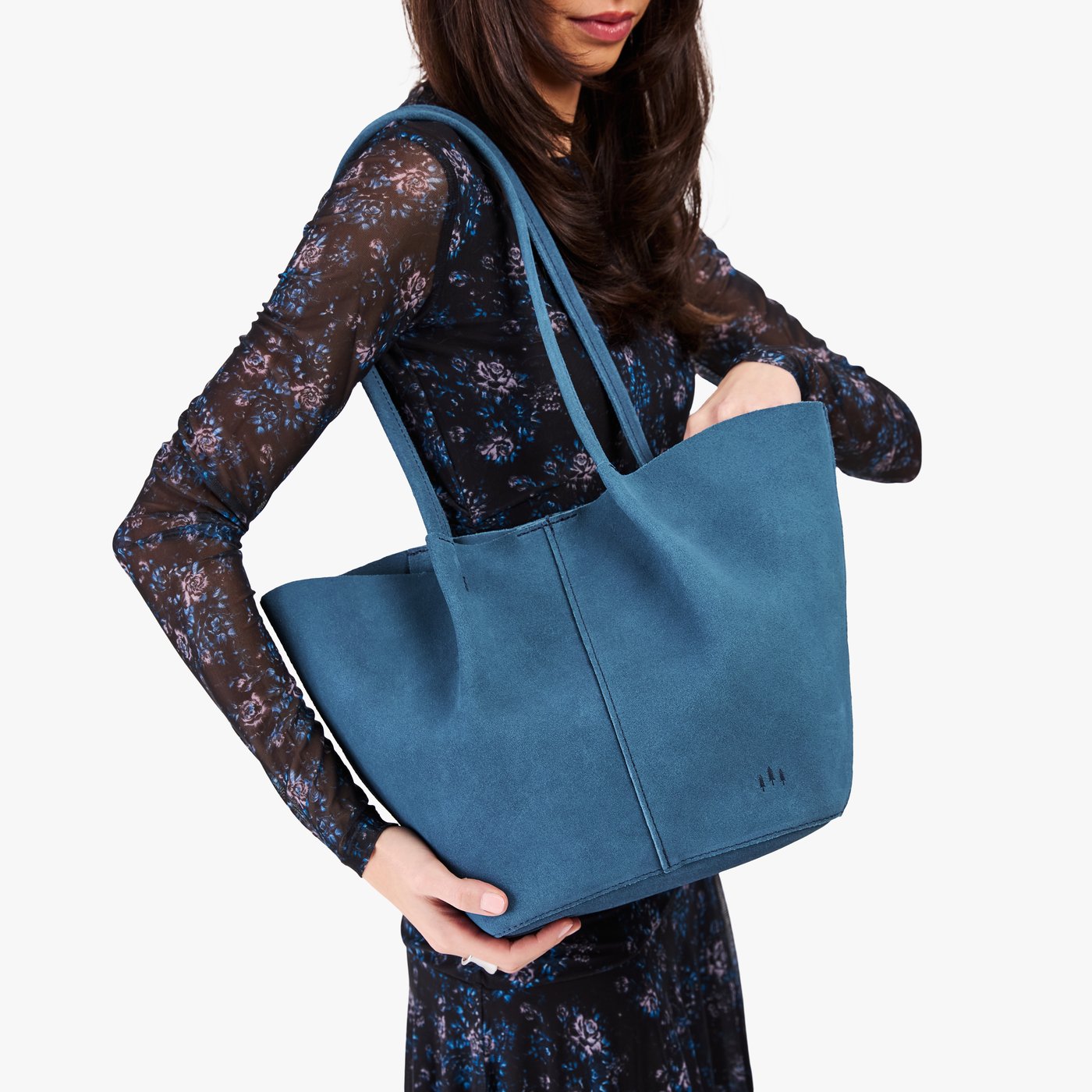 Mariner Blue*Large | Model holding a  leather tote bag 