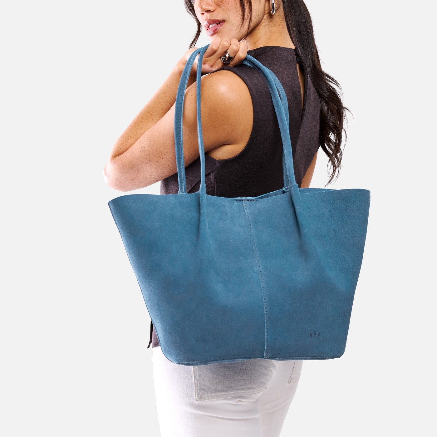 Mariner Blue*Oversized | Model holding extra wide bucket shaped tote bag with matching leather handles