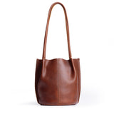 Nutmeg Small | Petite bucket shaped tote bag with matching leather handles