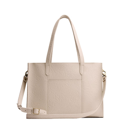 Jasmine | Structured wide embossed leather tote bag with overlapping panels and crossbody strap