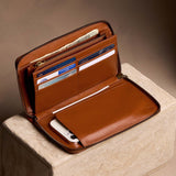 Vintage Tan | Full zip around wallet open with card and storage pockets