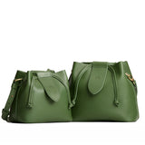 Cactus | Small and large symmetrical leather bags with leather drawstring closure and adjustable shoulder strap