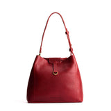 Chili Red Large | Symmetrical leather bag with leather drawstring closure and back ring for accessories