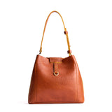 Sienna Large | Symmetrical leather bag with leather drawstring closure and back ring for accessories