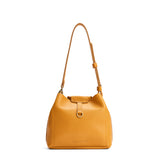 Sunshine Small | Symmetrical leather bag with leather drawstring closure and adjustable shoulder strap
